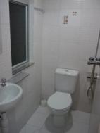 Clean and spacious toilet in every room.
