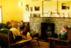 People chatting in sitting room