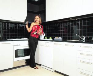 Full kitchen with oven, microwave and fridge