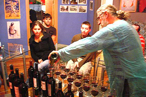 Staff running a weekly wine tasting