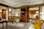 Deluxe Suites offer views of the water garden and city.