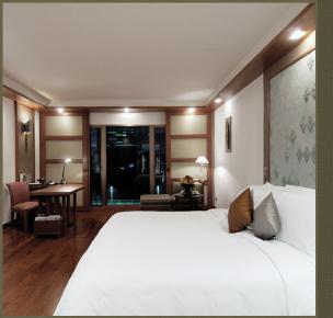 Deluxe Studio rooms are stylish and offer views of the pool and gardens.