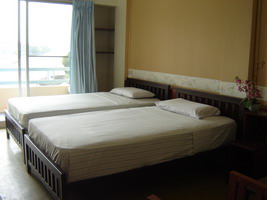 Double beds room with balcony on the river side.