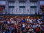 An audience sitting out the front of the Palais Montcalm, watching a performance during the Music and Comedy Festival held annually in August.