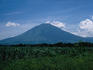 Looking across a farmers field towards San Miguel Volcano in southern El Salvador