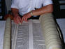 Rabbi restoring a 300 year old Torah. The Torah is a sacred Judaic scripture- Izmir, Izmir province, Turkey