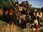 An overland trek that didn't quite make it, children from the village of Malealea make good use of an abandoned truck