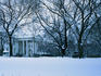 The White House and the surrounding grounds, blanketed by a cover of snow- Washington DC
