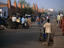 People and motorbikes on street, Bamako