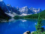 The impossibly blue waters of Moraine Lake, surrounded by the Rocky Mountains in the Banff National Park.