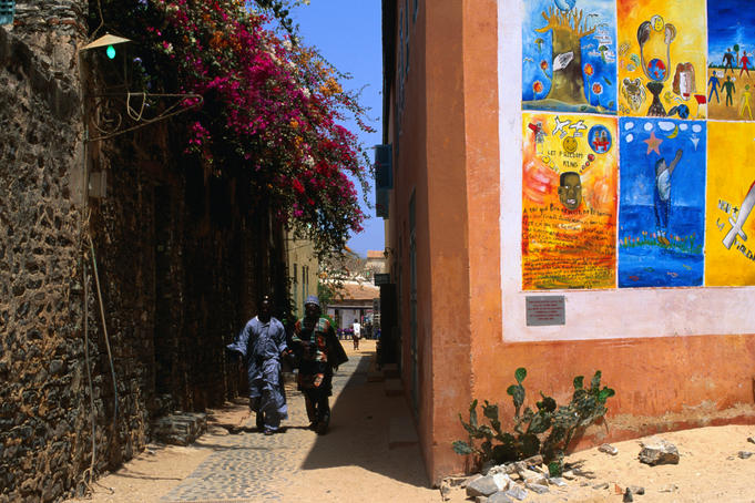 Brightly painted walls and narrow alleys of Ile de Goree.
