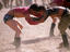 Men wrestling, Naadam Festival, Mongolia