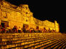 Tourists watching a sound and light show.