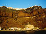 Buildings on top of and below volcanic cliffs (Thira).