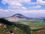 People looking across Jezreel Valley to Mount Tabor.