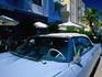 Classic American car parked in front of the Casablanca Hotel on Ocean Drive.