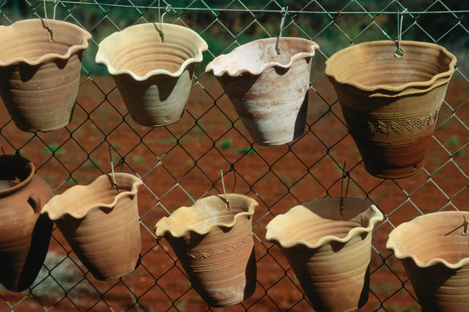 Local pottery ware hanging on a fence - Ibiza Island, Balearic Islands