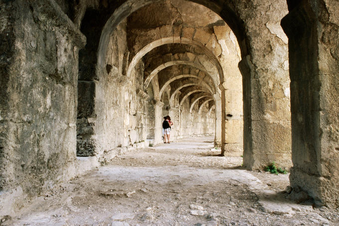 People in Aspendos Ampitheatre passageway.
