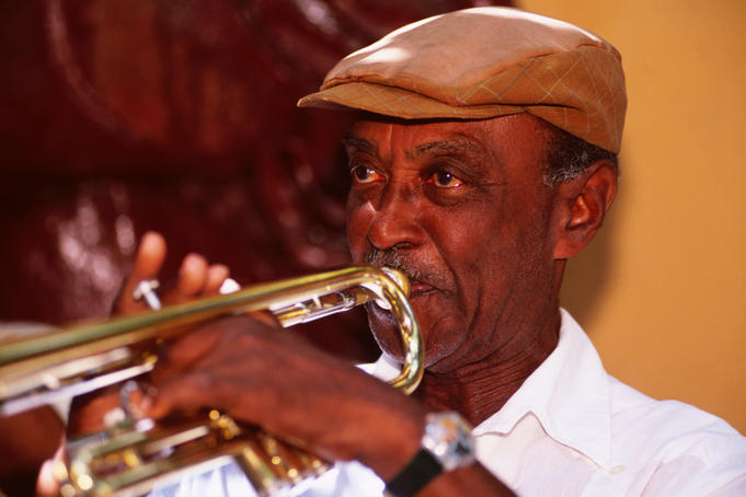 Traditional musician playing trumpet.