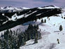 Snow covered ski run in Rocky Mountains.