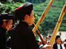 Maio men playing Lusheng pipes at festival.