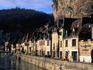 Waterfront buildings on the bank of the Dordogne River.