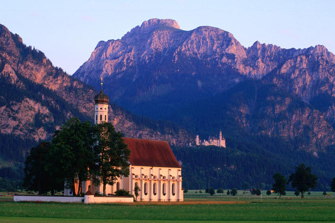 Church of St Coloman with Neuschwanstein Castle in background, Schwangau