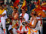 Costumed parade participants at Battle of Flowers carnival.