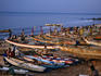 Traditional fishing pirogues line up on the Bakau beach at the end of the day.