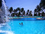 Swimming pool with fountain at hotel.