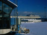 A deserted, snow covered Copenhagen airport on New Years Eve.