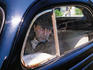 A mannequin in a 1937 Nash Lafayette black coupe in front of the Park Central Hotel, South Beach.