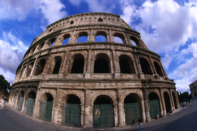 Colosseum The Colosseum or Flavian Amphitheatre of Rome. The building was begun by Vespasian, inaugurated by Titus in 80 AD and completed by Domitian.