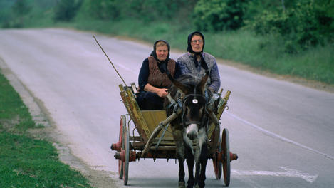 Women on donkey, Bulgeria