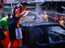 Spraying water water pistols to celebrate Thai New Year during Songkhran Festival.