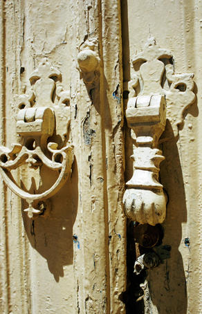 Traditional male and female door knockers, Old Town.