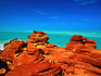 The blue of the sky, the green of the Indian Ocean and the red, red rock formations of Gantheaume Point, Broome