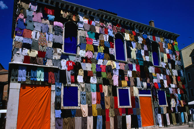Clothes as architecture: one way to hide incomplete restoration work on Scuola dei Varoteri.