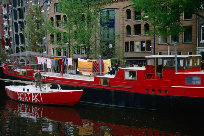 Doing the laundry on a houseboat on a canal in the Joordan area.
