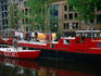Doing the laundry on a houseboat on a canal in the Joordan area.