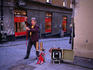 Street magician performing on a corner.