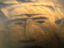 Underwater carved stone face (replica of Incan ruin), Simon Bolivar Zoo.