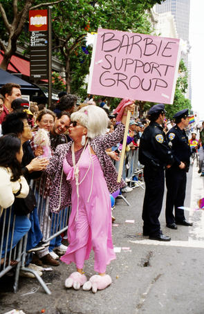 Gay Day Parade participant with sign.