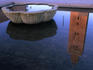 12th century Koutoubia minaret (70m) reflected in a fountain.