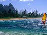 A windsurfer surfing off Bali Hai, a north shore beach.