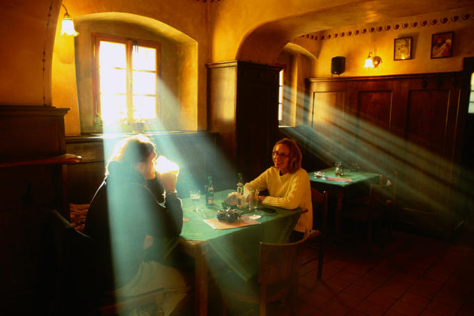 Sunlight streams through the window into Hostinec Pub in Kampa.