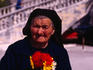 An elderly woman selling flowers in Korcula.