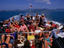 A boat load of tourists enroute from Koh Samui to Koh Pha-Ngan.