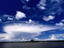 Cumulonimbus cloud formation over river.