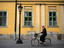 Cycling cobbled Szechenyi utca in Eger.